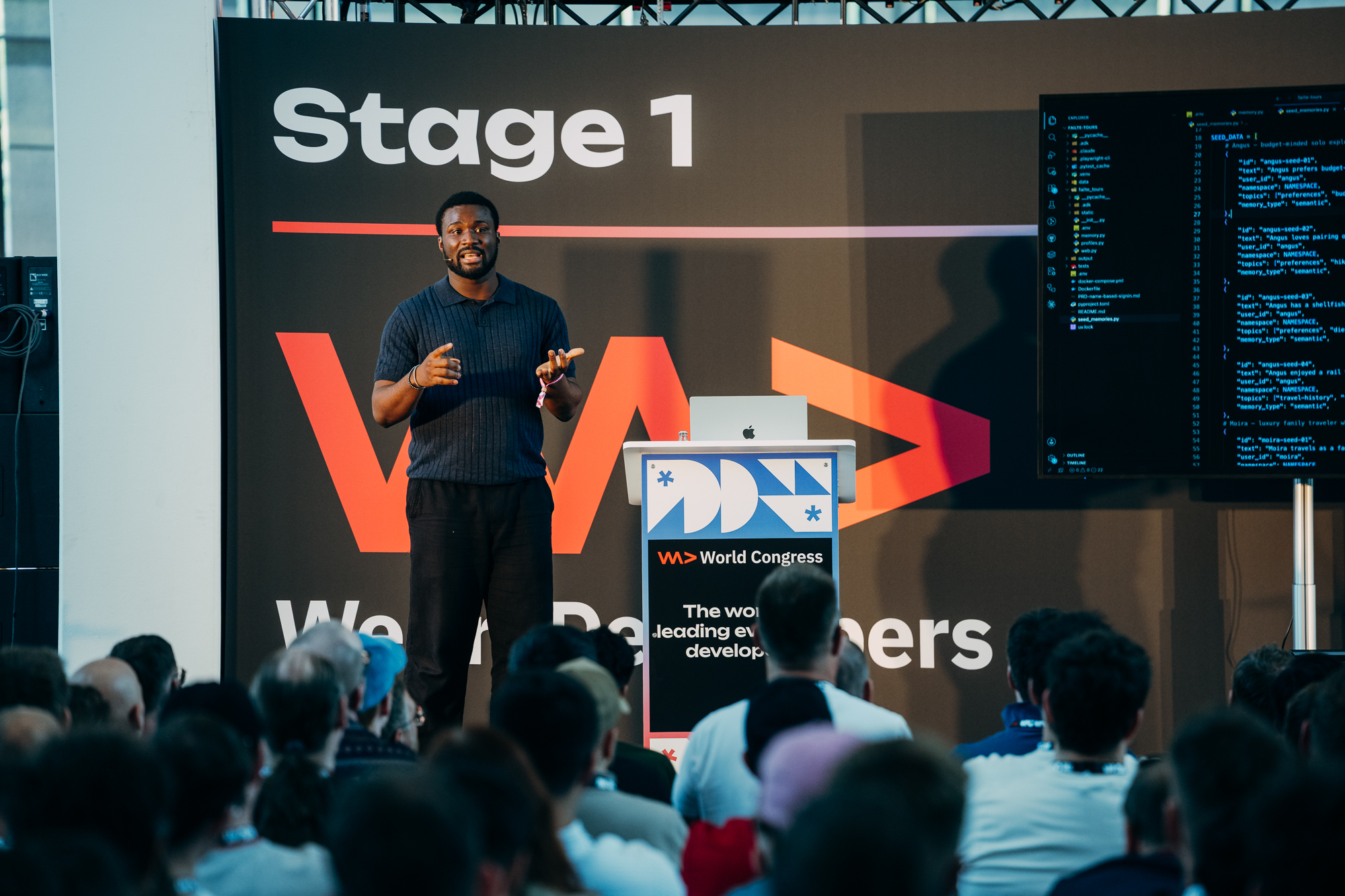 Samuel presenting with code visible on screen at WeAreDevelopers World Congress.